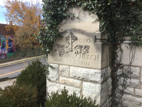 Corner stone to st Andrews church oolitic limestone with Dayton limestone handressed veneer stone above it-Samuel Hannaford architect design