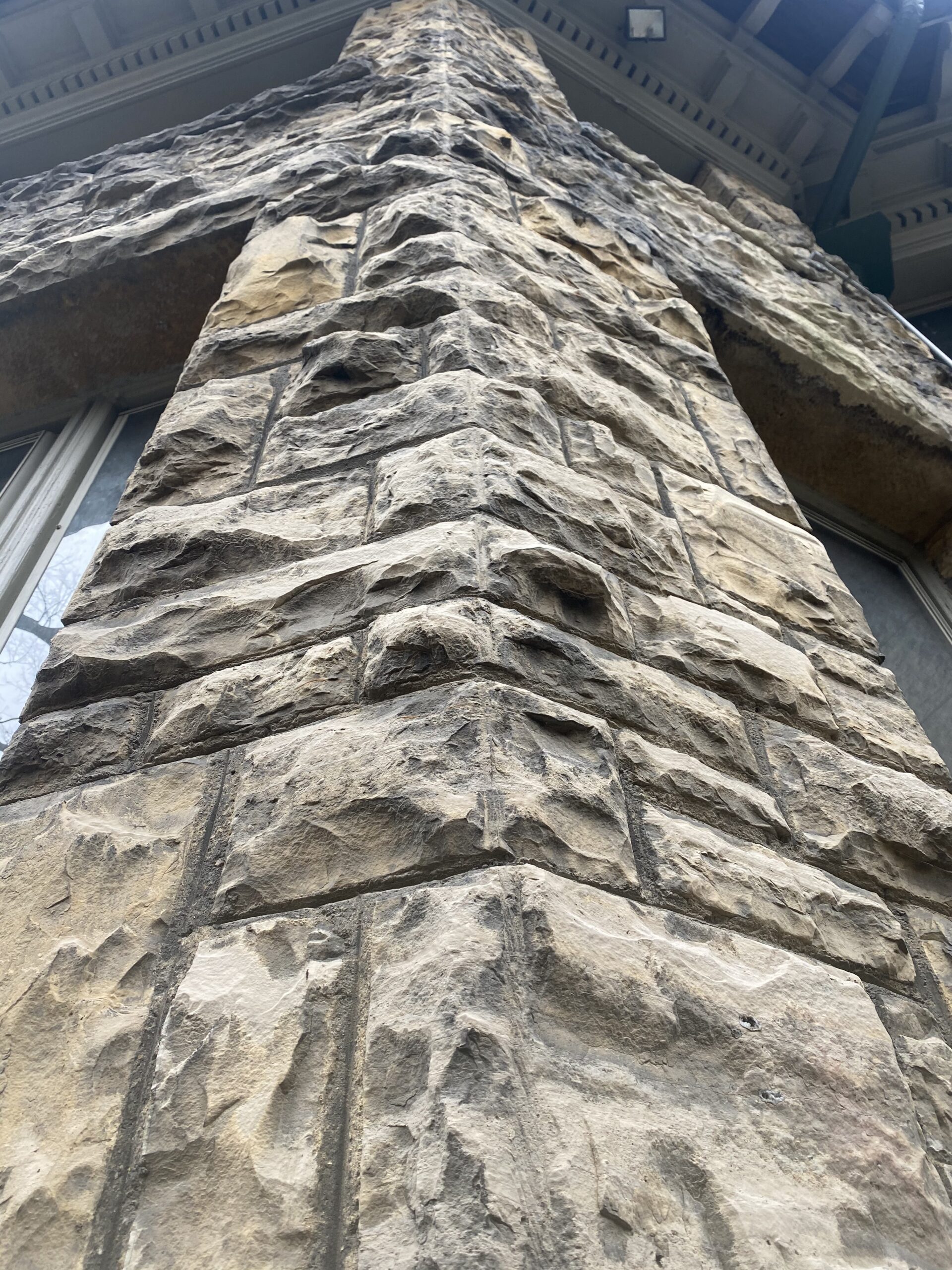 Dolostone reclaimed trolley car manufacturing wharehouse veneer 1895 -John Kilgore owner, iniquity characteristic of stone corners are up to 19 inches thick